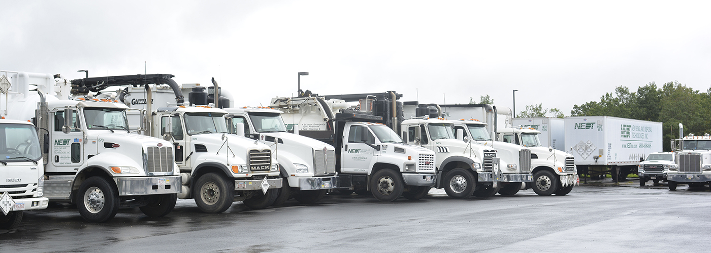 Lineup of NEDT's Hazardous Waste Disposal and Transportation truck fleet.